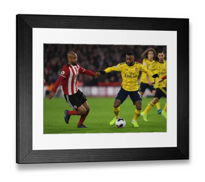 Framed Print : Alexandre Lacazette vs. David McGoldrick: Clash at Bramall Lane - Sheffield United vs. Arsenal, Premier League 2019-20