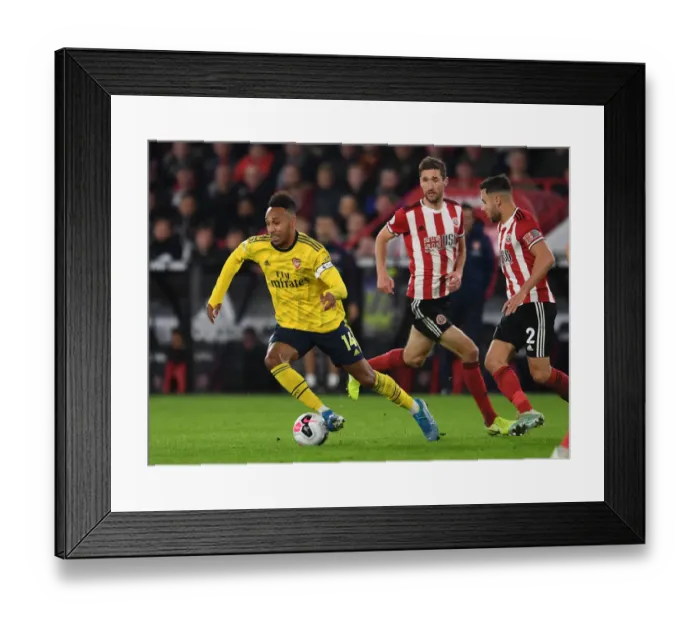 Framed Print : Aubameyang vs. Basham: Clash at Bramall Lane - Sheffield United vs. Arsenal, Premier League 2019-20