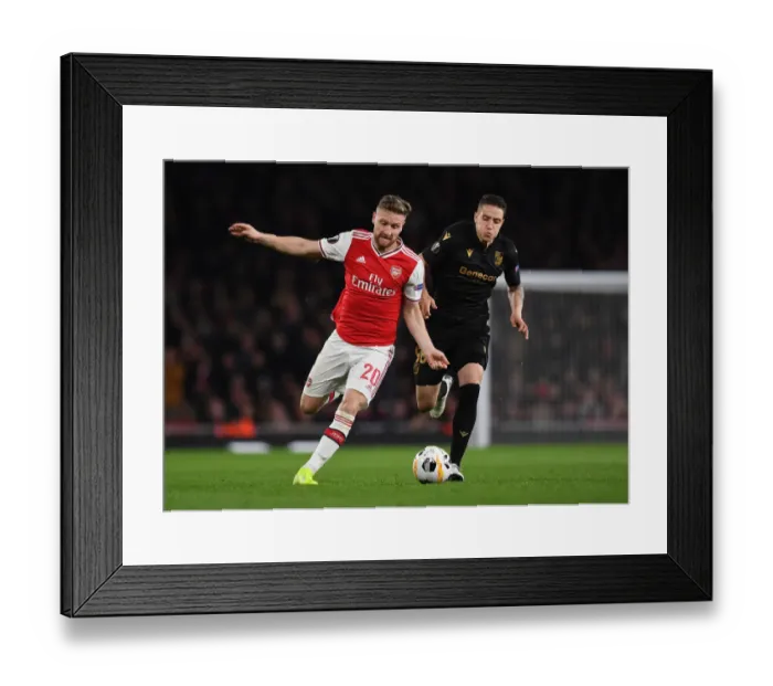 Framed Print : Arsenal vs Vitoria Guimaraes: Clash in Group F - UEFA Europa League (Mustafi vs Duarte)