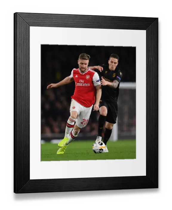 Framed Print : Mustafi vs. Duarte: Clash of the Centrals in Arsenal's Europa League Battle against Vitoria Guimaraes Framed Print : Mustafi vs. Duarte: Clash of the Centrals in Arsenal's Europa League Battle against Vitoria Guimaraes
