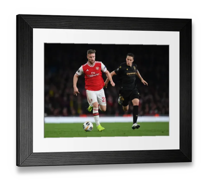 Framed Print : Mustafi vs Duarte: A Europa League Showdown at Arsenal's Emirates Stadium