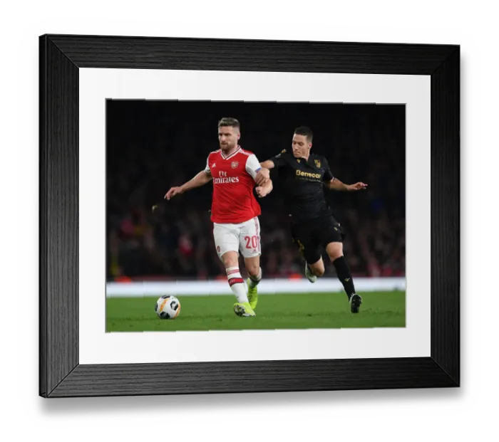 Framed Print : Mustafi vs Duarte: A Battle in Arsenal's Europa League Clash Against Vitoria Guimaraes