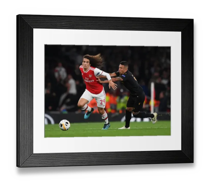 Framed Print : Guendouzi vs. Duarte: A Battle in Arsenal's Europa League Clash against Vitoria Guimaraes Framed Print : Guendouzi vs. Duarte: A Battle in Arsenal's Europa League Clash against Vitoria Guimaraes