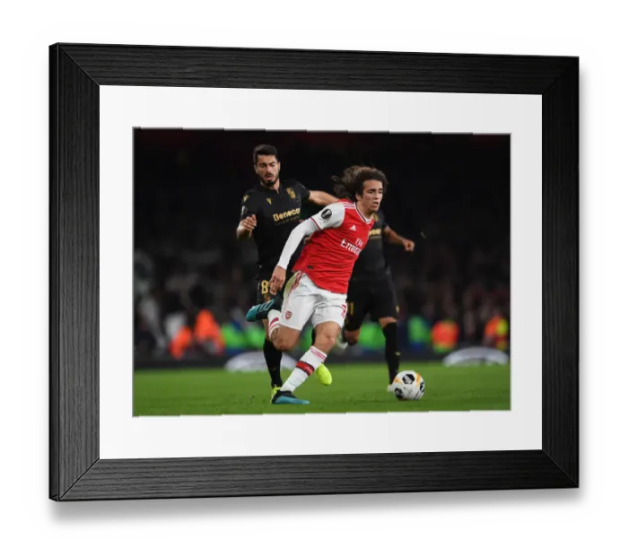 Framed Print : Guendouzi vs Pepe: Europa League Showdown at Arsenal's Emirates Stadium