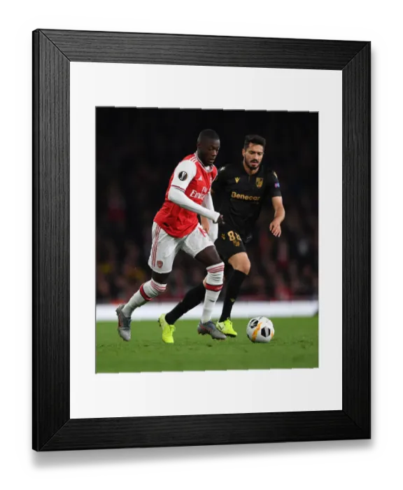 Framed Print : Arsenal's Pepe Clashes with Vitoria's Pepe in Europa League Showdown