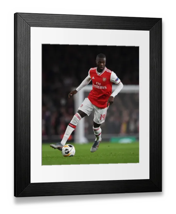 Framed Print : Arsenal's Nicolas Pepe in Action: Arsenal FC vs. Vitoria Guimaraes, UEFA Europa League 2019-20