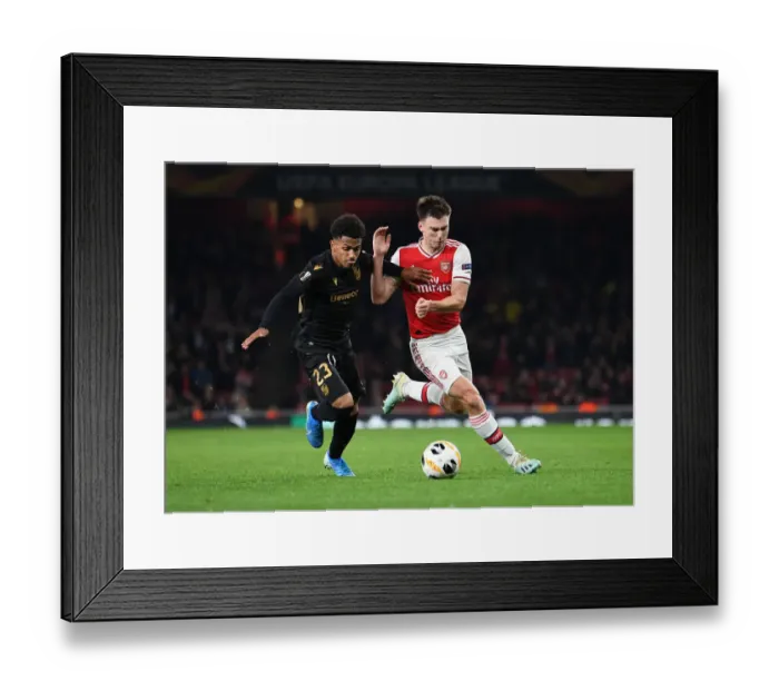 Framed Print : Arsenal vs Vitoria Guimaraes: Kieran Tierney Clashes with Marcus Edwards in UEFA Europa League Match Framed Print : Arsenal vs Vitoria Guimaraes: Kieran Tierney Clashes with Marcus Edwards in UEFA Europa League Match