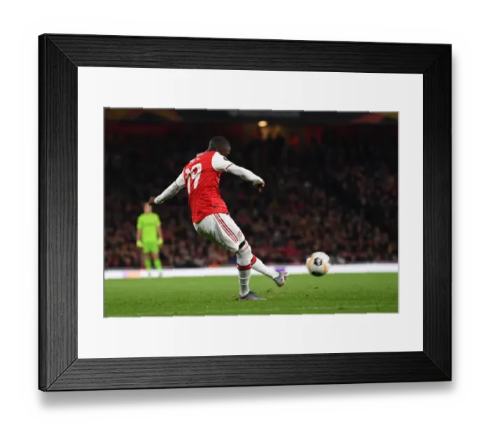 Framed Print : Arsenal's Nicolas Pepe Scores Second Goal Against Vitoria Guimaraes in Europa League Match Framed Print : Arsenal's Nicolas Pepe Scores Second Goal Against Vitoria Guimaraes in Europa League Match