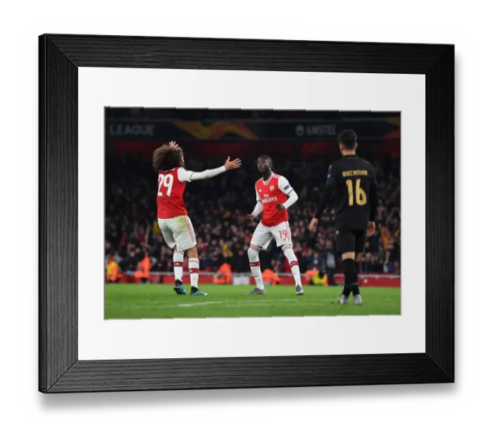 Framed Print : Nicolas Pepe's Hat-Trick: Arsenal Secures Europa League Victory over Vitoria Guimaraes Framed Print : Nicolas Pepe's Hat-Trick: Arsenal Secures Europa League Victory over Vitoria Guimaraes