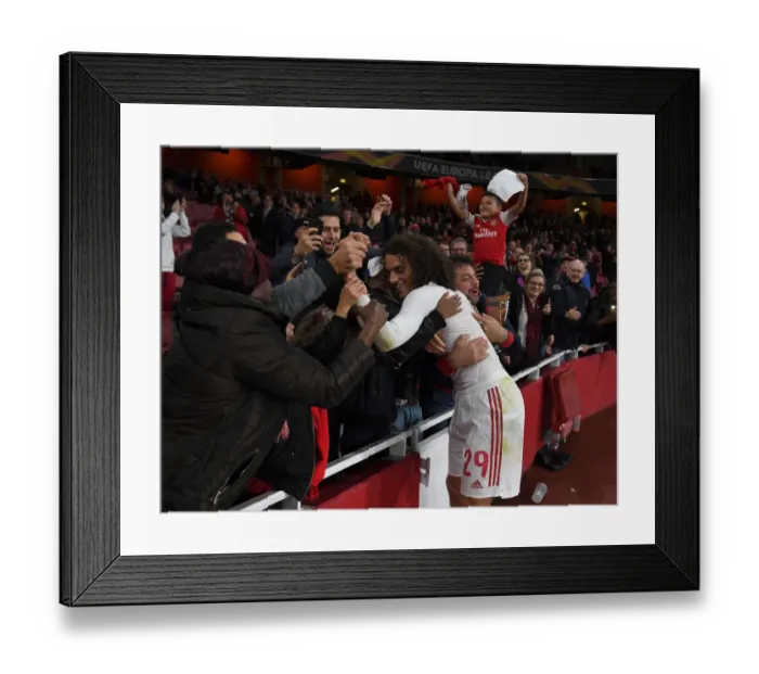 Framed Print : Arsenal's Guendouzi Gifts Shirt to Ecstatic Fan After Europa League Victory
