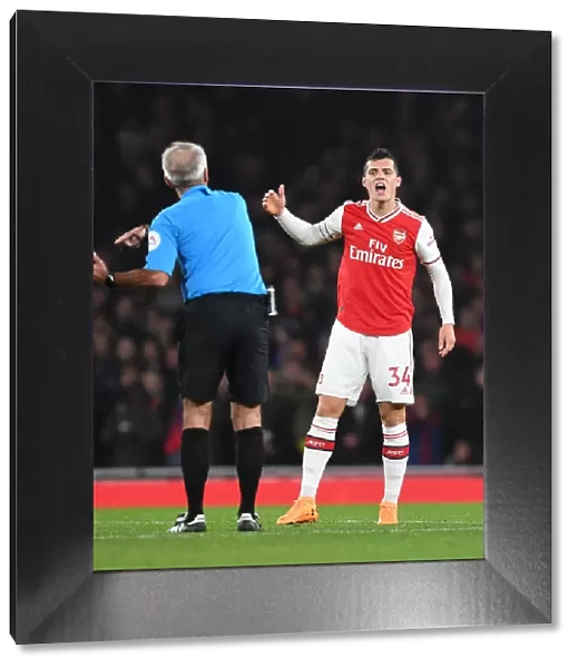 Arsenal's Xhaka Protests Referee Decision During Arsenal vs. Crystal Palace Premier League Clash
