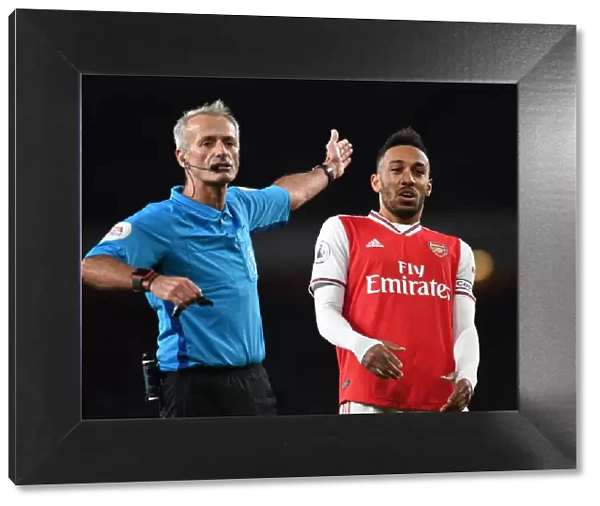 Arsenal's Aubameyang Faces Off with Referee during Arsenal vs. Crystal Palace (2019-20)