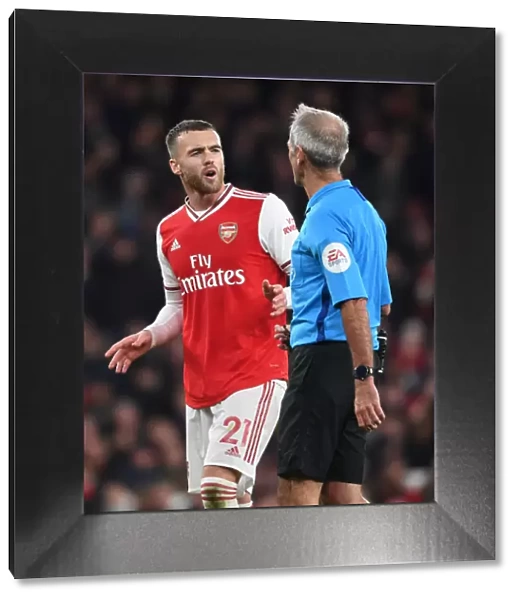 Calum Chambers Argues with Referee Martin Atkinson during Arsenal vs. Crystal Palace Match