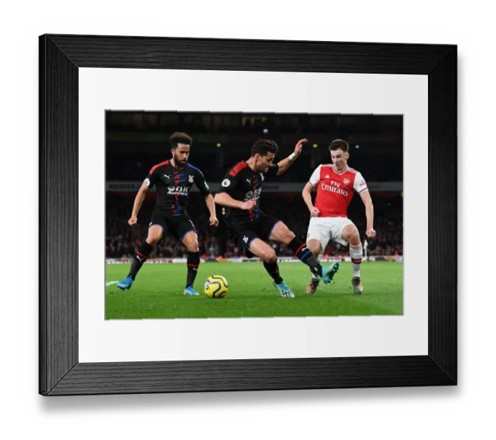 Framed Print : Arsenal's Tierney Outwits Palace Defenders in Premier League Clash
