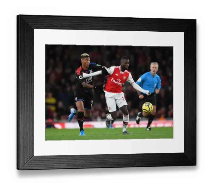 Framed Print : Arsenal vs Crystal Palace: Pepe vs van Aanholt Clash in Premier League Showdown