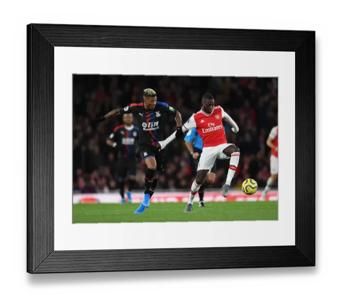 Framed Print : Pepe vs van Aanholt: A Premier League Showdown at Emirates Stadium