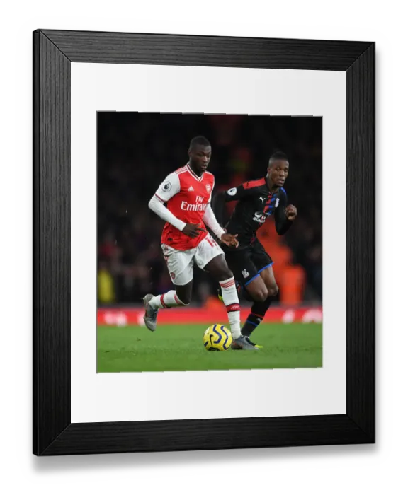 Framed Print : Battle of the Wings: Pepe vs Zaha - Arsenal vs Crystal Palace Rivalry in Premier League Framed Print : Battle of the Wings: Pepe vs Zaha - Arsenal vs Crystal Palace Rivalry in Premier League