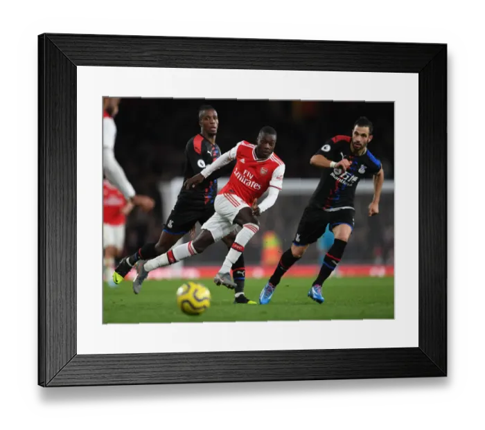 Framed Print : Arsenal's Pepe Faces Pressure from Palace's Zaha and Milivojevic during Premier League Clash
