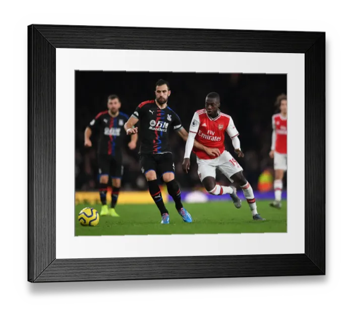 Framed Print : Arsenal's Pepe Clashes with Palace's Milivojevic in Premier League Showdown Framed Print : Arsenal's Pepe Clashes with Palace's Milivojevic in Premier League Showdown