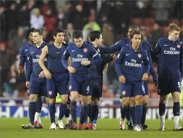 Arsenal's Triumph: Celebrating a 3-1 Win over Stoke City in the Premier League
