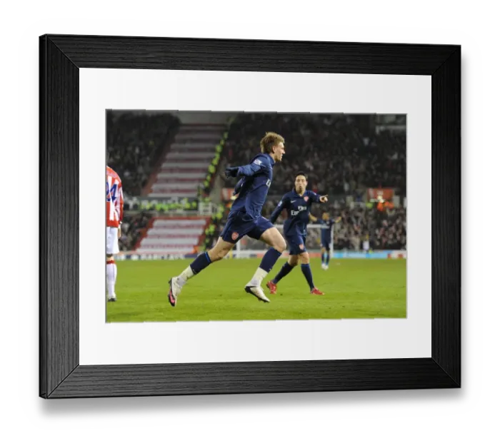 Framed Print : Nicklas Bendtner's Thrilling First Goal: Arsenal Crushes Stoke City 3-1 in the Premier League
