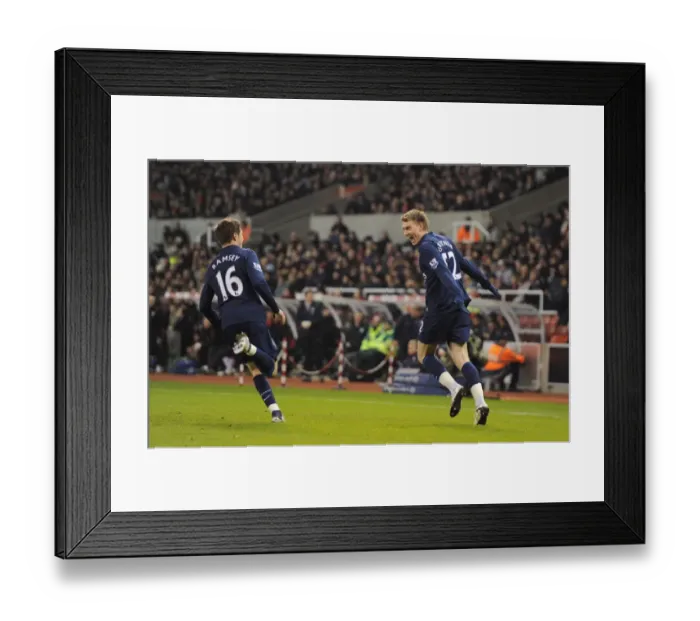 Framed Print : Bendtner and Ramsey: Celebrating Arsenal's First Goal in Stoke's Britanna Stadium (27 / 2 / 2010)