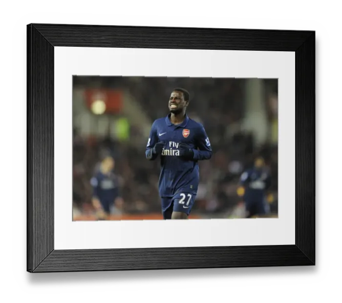 Framed Print : Emmanuel Eboue (Arsenal). Stoke City 1: 3 Arsenal, Barclays Premier League