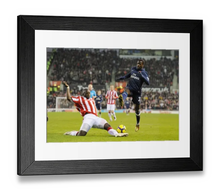 Framed Print : Arsenal's Emmanuel Eboue Shines in 3-1 Victory Over Stoke City