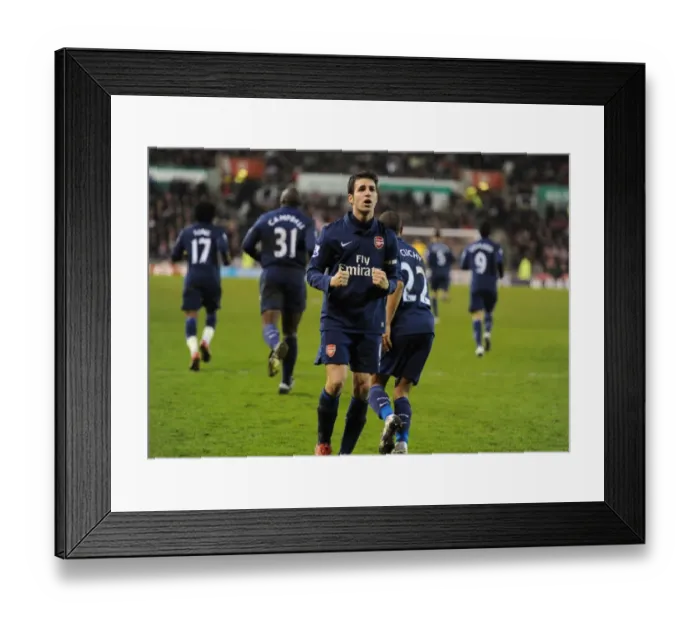 Framed Print : Arsenal's Unforgettable Victory: Cesc Fabregas Scores Stunner in 3-1 Crush of Stoke City