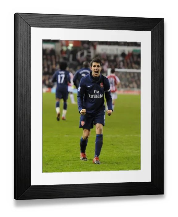 Framed Print : Cesc Fabregas's Stunner: Arsenal's Triumphant 3-1 Over Stoke City