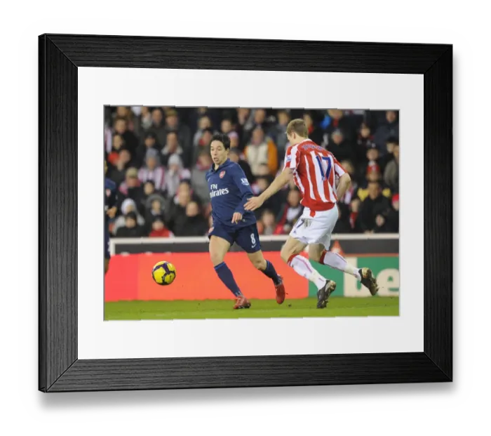 Framed Print : Samir Nasri (Arsenal) Ryan Shawcross (Stoke). Stoke City 1: 3 Arsenal, Barclays Premier League Framed Print : Samir Nasri (Arsenal) Ryan Shawcross (Stoke). Stoke City 1: 3 Arsenal, Barclays Premier League