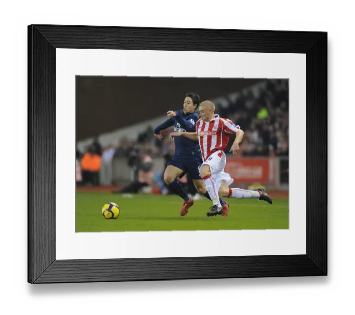 Framed Print : Samir Nasri (Arsenal) Andy Wilkinson (Stoke). Stoke City 1: 3 Arsenal, Barclays Premier League Framed Print : Samir Nasri (Arsenal) Andy Wilkinson (Stoke). Stoke City 1: 3 Arsenal, Barclays Premier League
