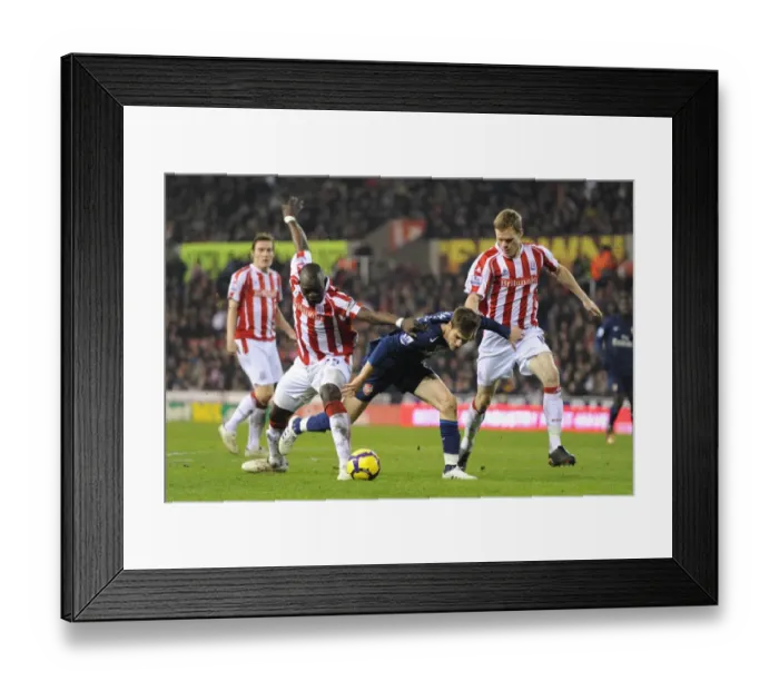 Framed Print : Arsenal's Ramsey Scores Twice as Gunners Overpower Shawcross and Faye's Stoke