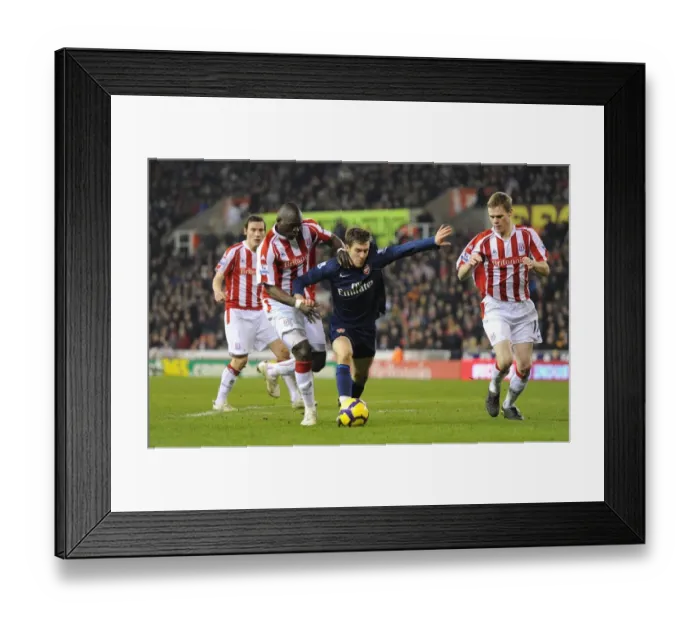 Framed Print : Aaron Ramsey (Arsenal) Ryan Shawcross and Abdoulaye Faye (Stoke). Stoke City 1: 3 Arsenal Framed Print : Aaron Ramsey (Arsenal) Ryan Shawcross and Abdoulaye Faye (Stoke). Stoke City 1: 3 Arsenal