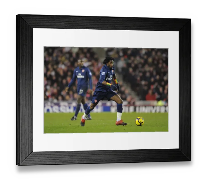 Framed Print : Alex Song (Arsenal). Stoke City 1: 3 Arsenal, Barclays Premier League, The Britanna Stadium