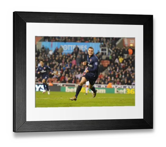 Framed Print : Thomas Vermaelen celebrates scoring the 3rd Arsenal goal. Stoke City 1: 3 Arsenal