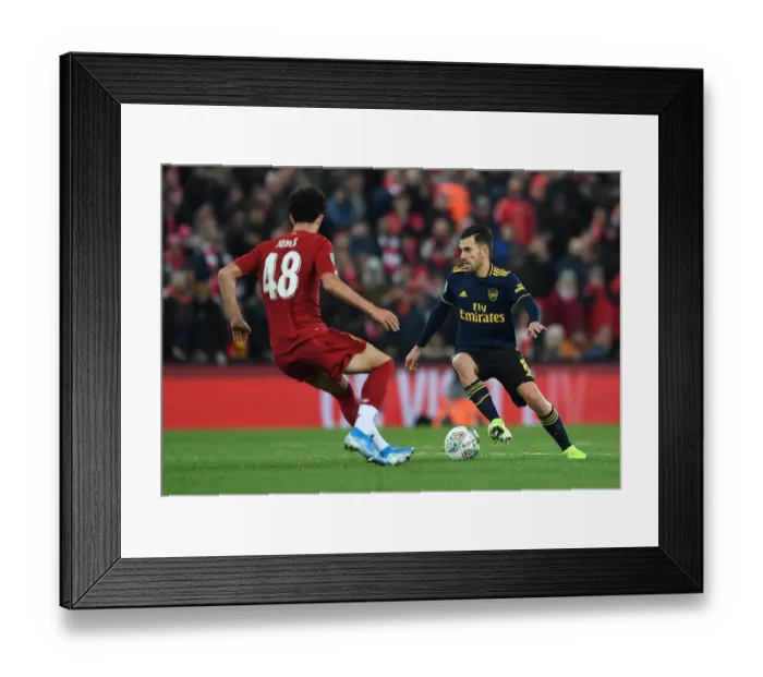 Framed Print : Arsenal's Dani Ceballos Faces Off Against Liverpool in Carabao Cup Showdown