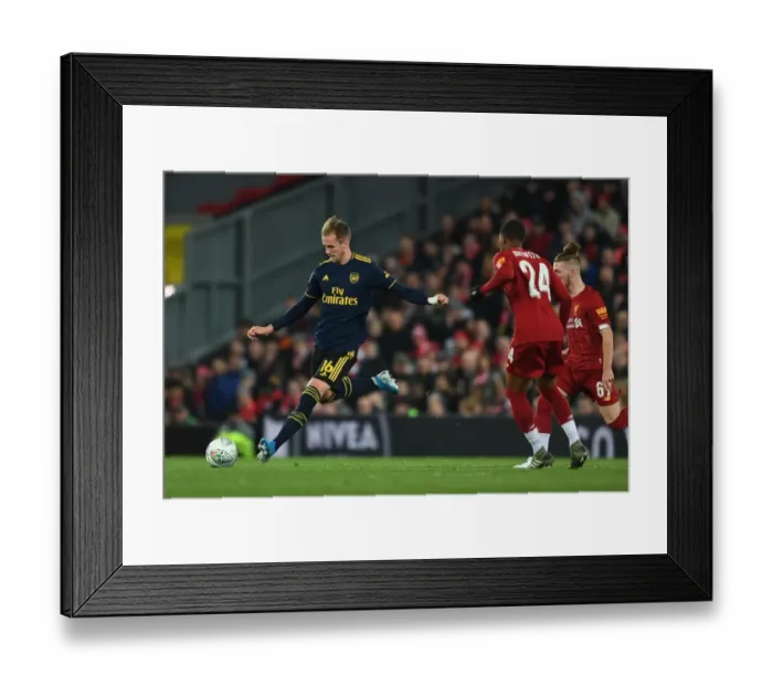 Framed Print : Rob Holding's Heroic Defensive Performance: Arsenal's Carabao Cup Battle at Anfield vs. Liverpool