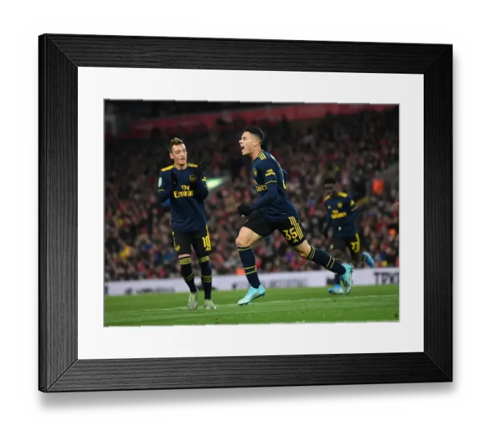Framed Print : Martinelli's Brace: Arsenal Shocks Liverpool in Carabao Cup