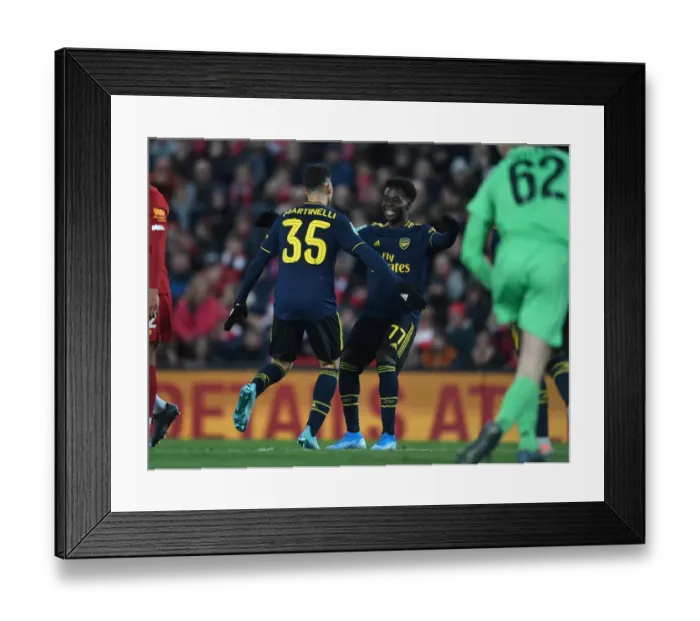 Framed Print : Martinelli and Saka's Stunning Goals: Arsenal's Carabao Cup Triumph over Liverpool