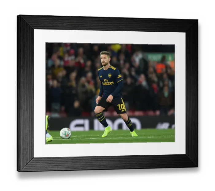 Framed Print : Arsenal's Mustafi Faces Off Against Liverpool in Carabao Cup Showdown Framed Print : Arsenal's Mustafi Faces Off Against Liverpool in Carabao Cup Showdown