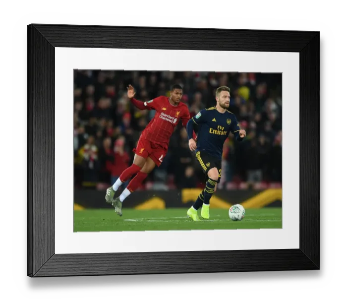 Framed Print : Mustafi vs Brewster: Liverpool vs Arsenal in Carabao Cup Showdown