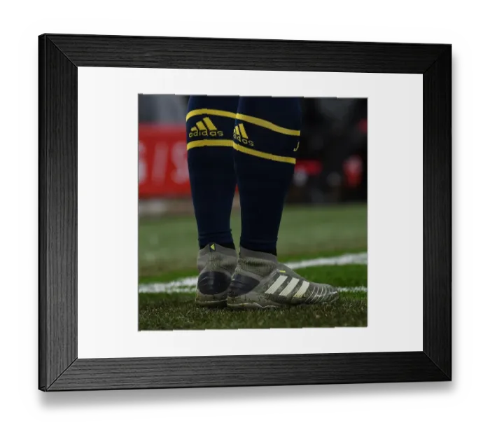 Framed Print : Mesut Ozil Faces Off Against Liverpool: Carabao Cup Showdown