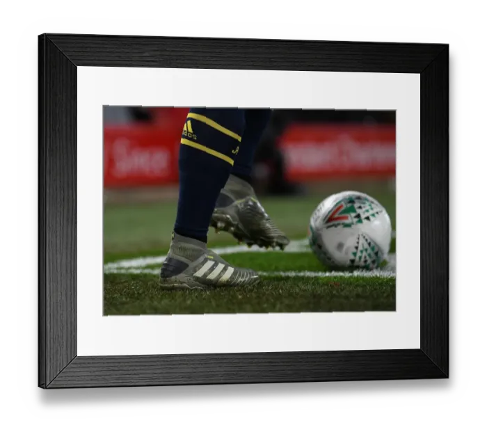 Framed Print : Mesut Ozil vs Liverpool: A Carabao Cup Battle at Anfield