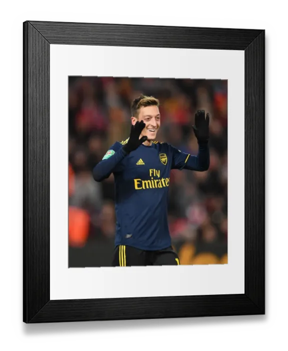 Framed Print : Mesut Ozil Celebrates Arsenal's Four-Goal Lead Over Liverpool in Carabao Cup Framed Print : Mesut Ozil Celebrates Arsenal's Four-Goal Lead Over Liverpool in Carabao Cup