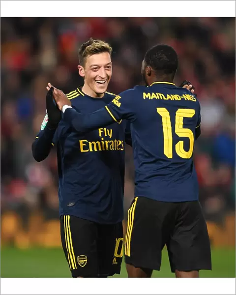 Mesut Ozil and Ainsley Maitland-Niles Celebrate Arsenal's Four Goals Against Liverpool in Carabao Cup