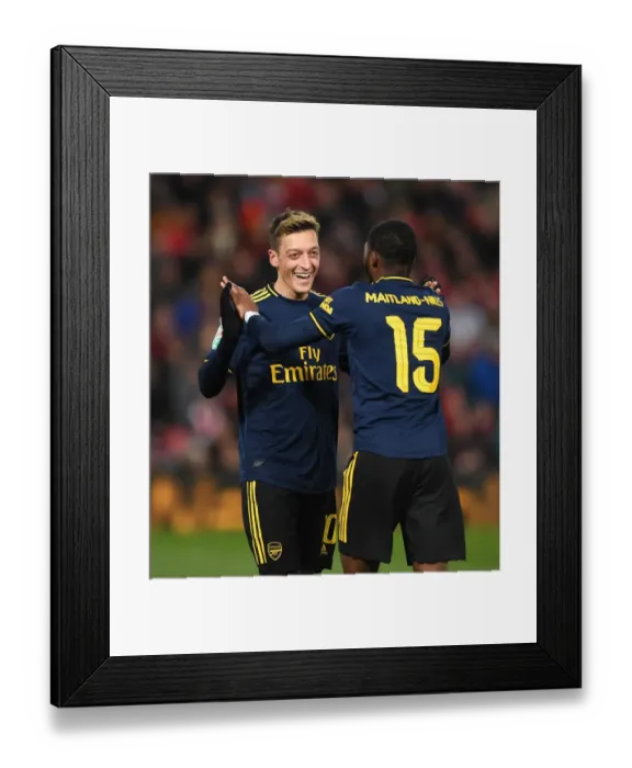 Framed Print : Mesut Ozil and Ainsley Maitland-Niles Celebrate Arsenal's Four Goals Against Liverpool in Carabao Cup