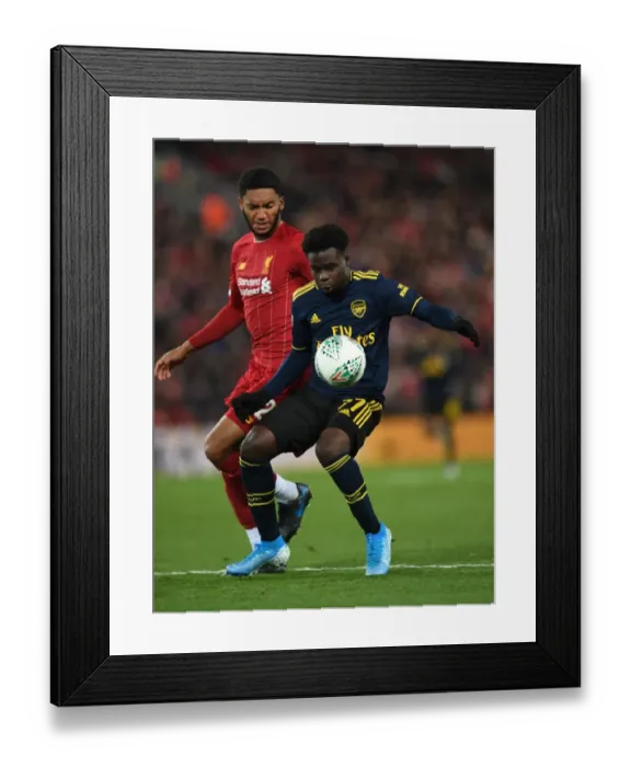 Framed Print : Bukayo Saka vs Joe Gomez: A Footballing Battle at Anfield - Carabao Cup Showdown Framed Print : Bukayo Saka vs Joe Gomez: A Footballing Battle at Anfield - Carabao Cup Showdown