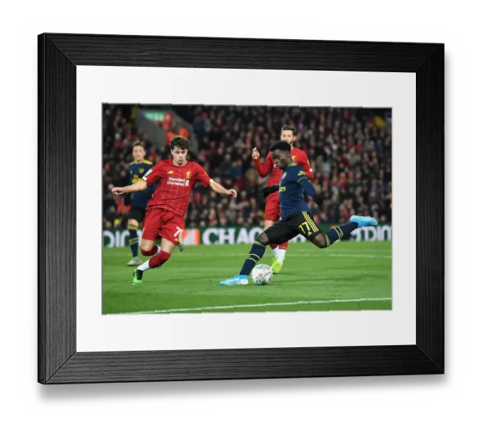 Framed Print : Bukayo Saka vs. Neco Williams: Intense Battle at Anfield - Carabao Cup 2019-20: Liverpool vs. Arsenal Framed Print : Bukayo Saka vs. Neco Williams: Intense Battle at Anfield - Carabao Cup 2019-20: Liverpool vs. Arsenal