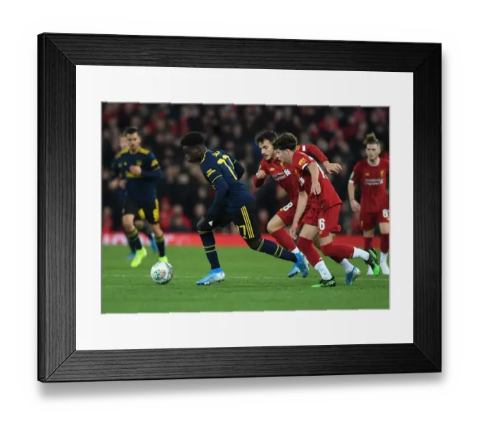Framed Print : Bukayo Saka vs. Neco Williams: Carabao Cup Showdown - Liverpool vs. Arsenal